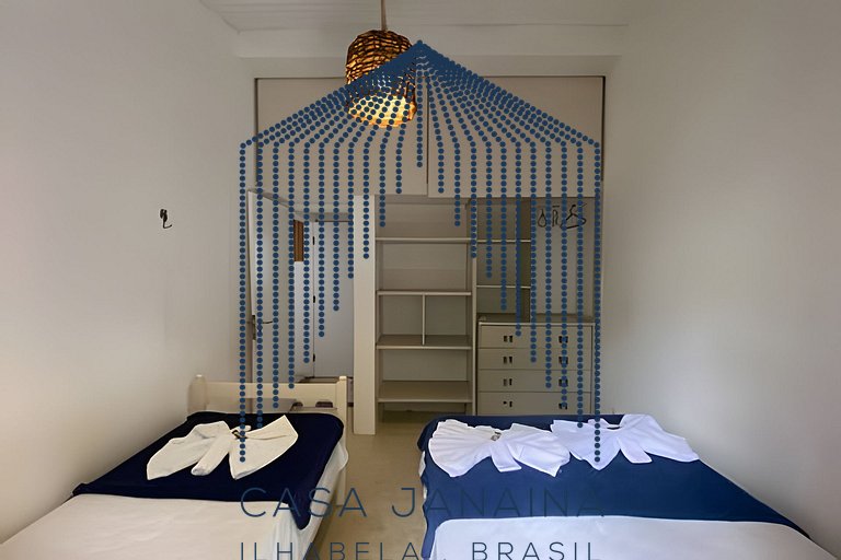 Quarto em casa beira-mar c/ piscina - Ilhabela